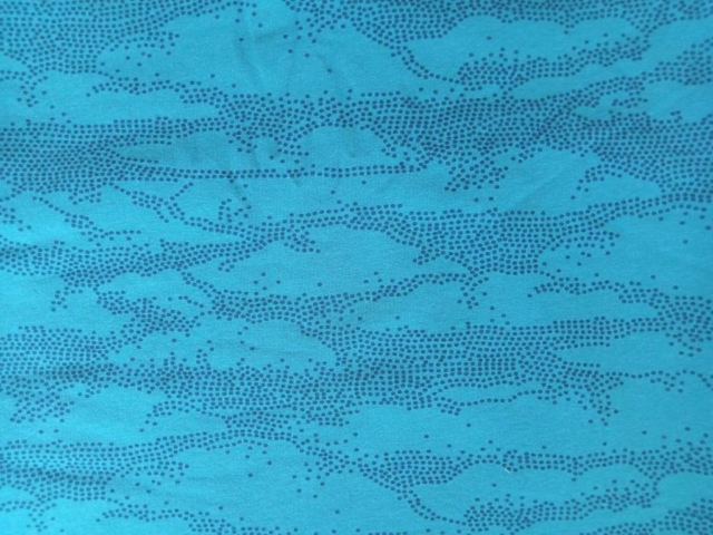 Tissu sweat motifs vagues sur fond bleu vert certifié OekoTex 100